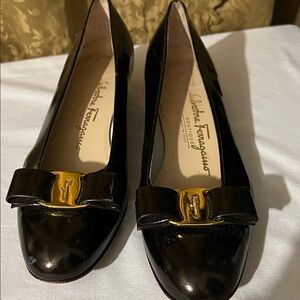 Salvatore Ferragamo Black Patent Flats with Gold Accent